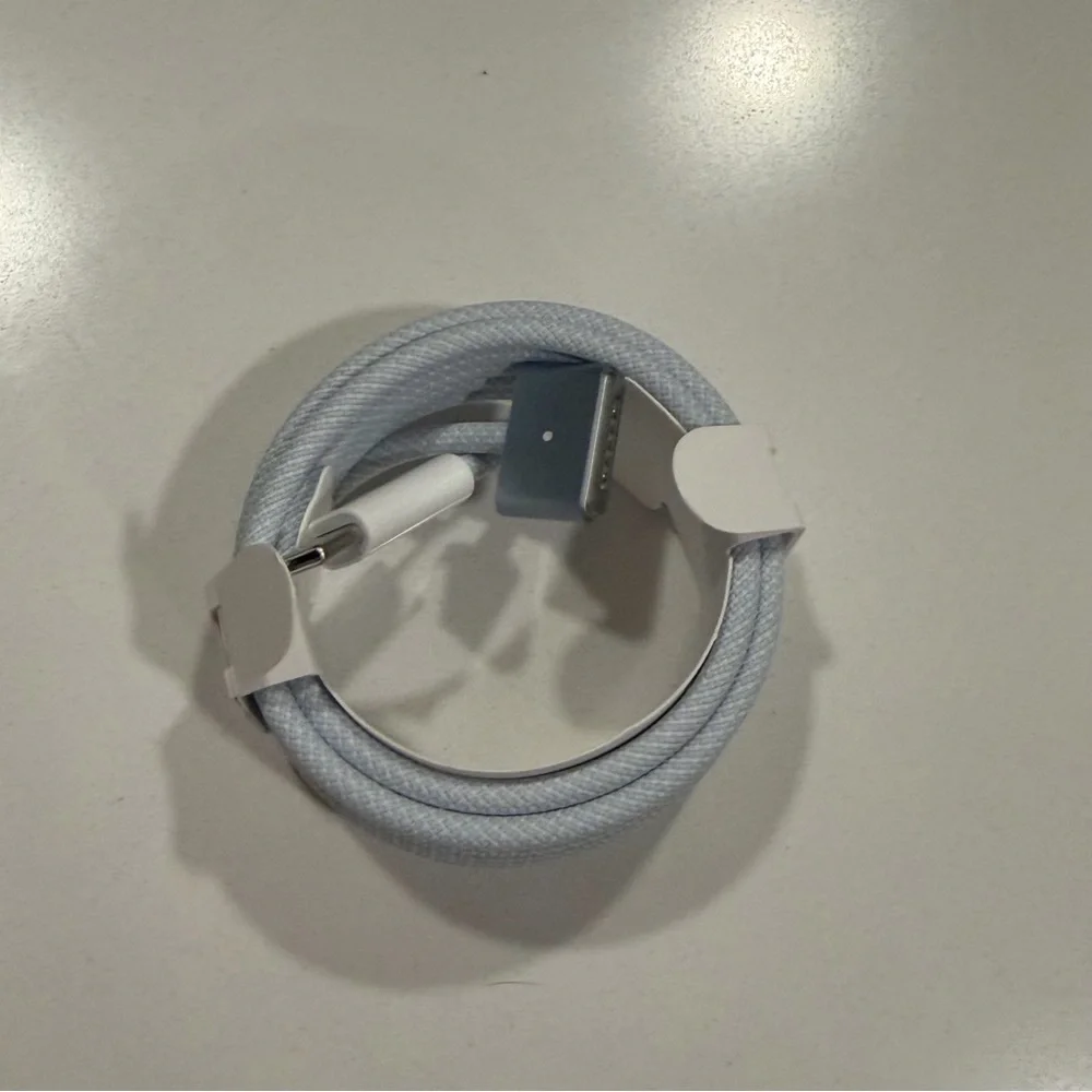 Apple USB-C to MagSafe 3 Cable in black. MacBook charger